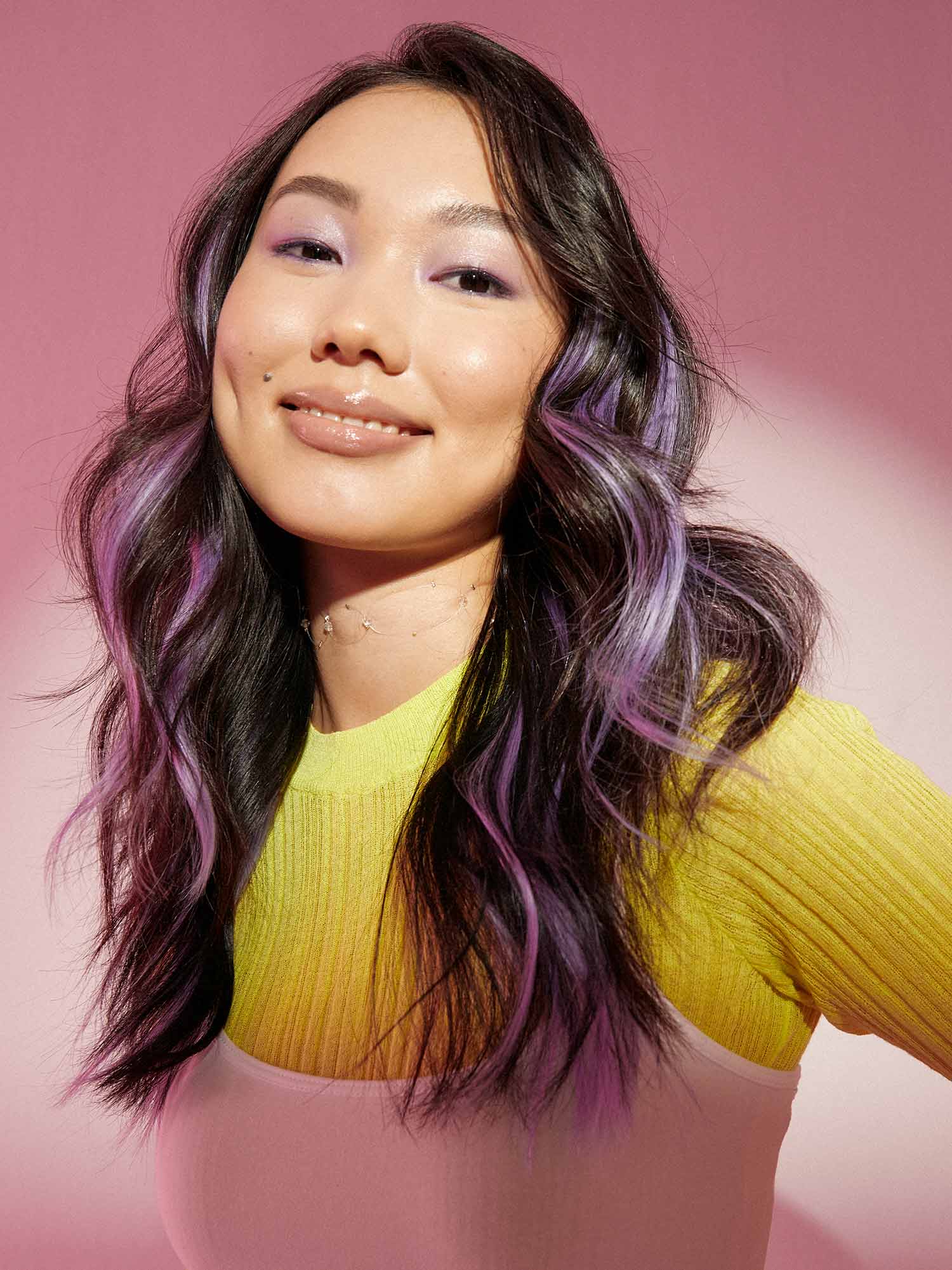 Ayurika wearing our Peekaboo Halo® in <a href="https://luxyhaircom/products/purple-peekaboo-hair-halo-extensions"> Lilac </a> image