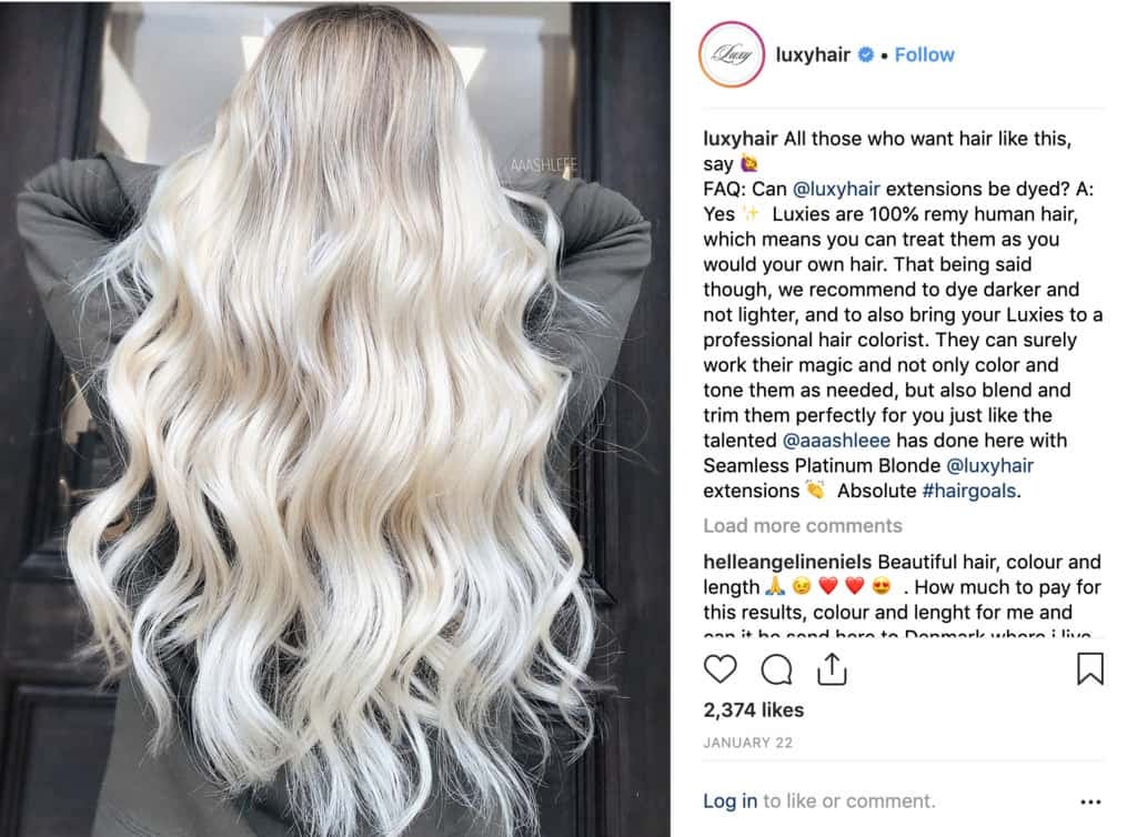 An Instagram post showing text on the left side with a lady on the right side with white curly hair extensions.